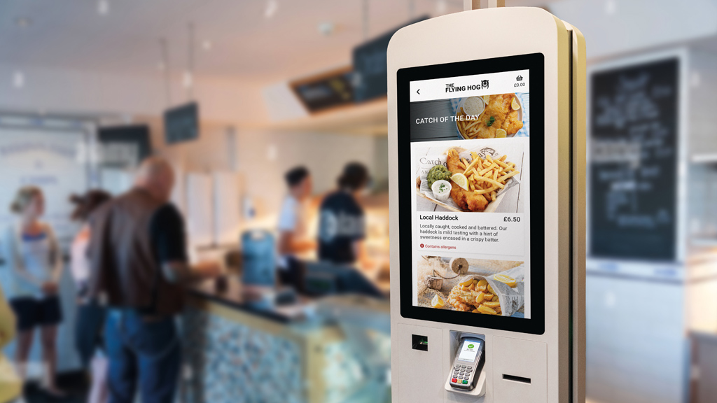 Customer being served at fish and chip shop