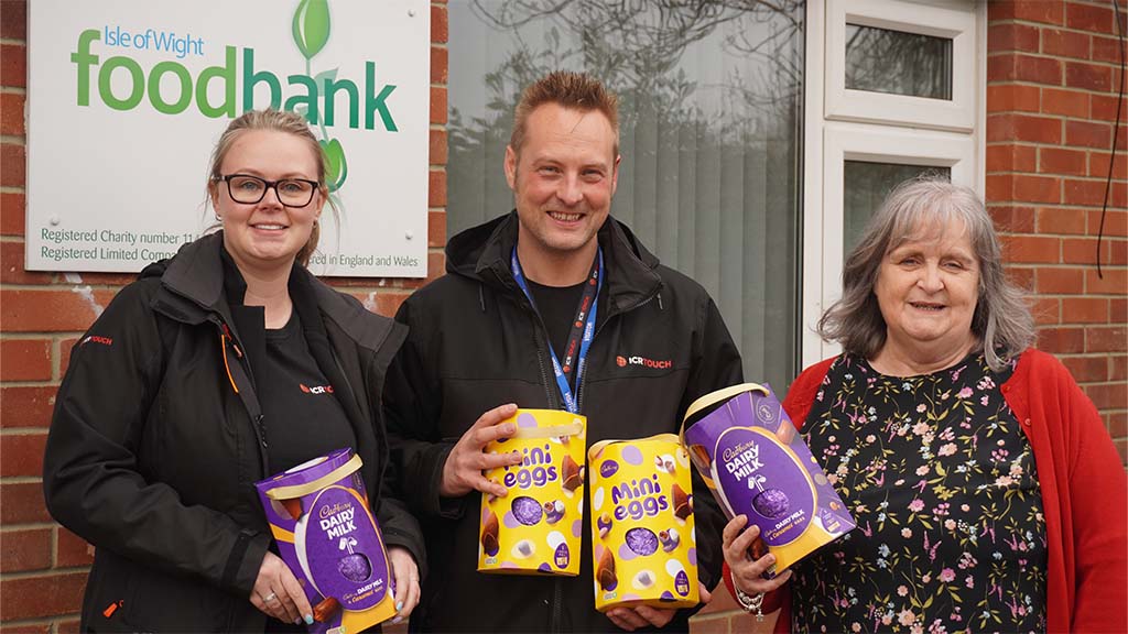ICRTouch team meet Foodbank Manager, Kay to donate easter eggs