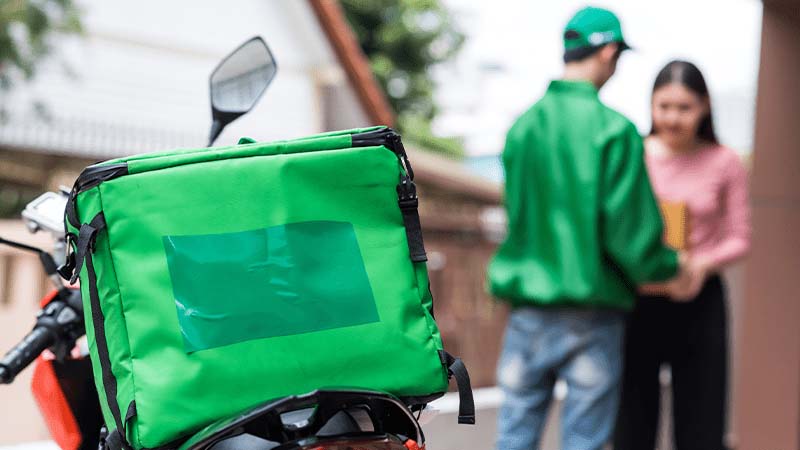 Delivery driver collecting food