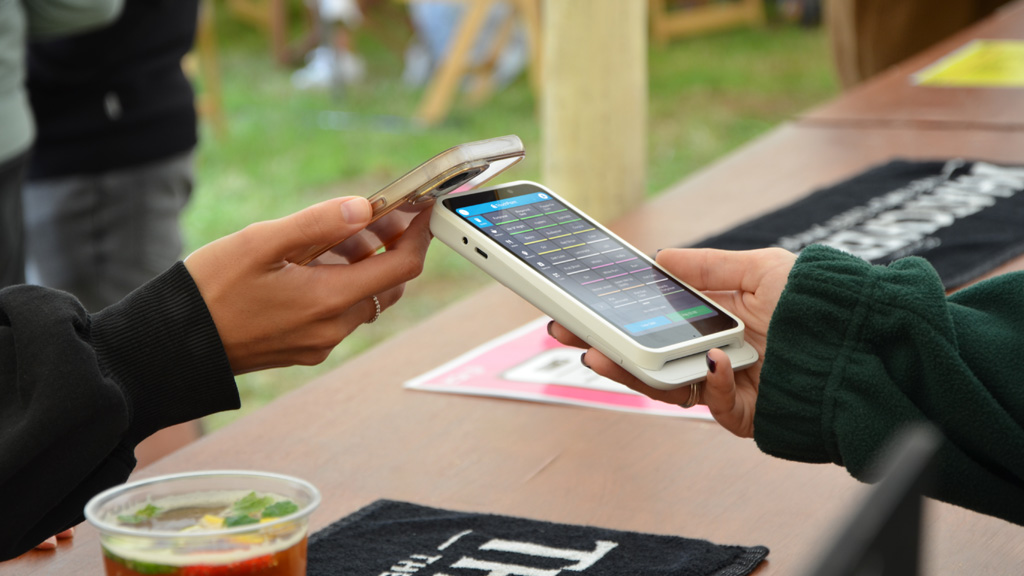 Samsung A9 tablet on Bouncepad running TouchPoint lite with a Stripe Wise pad next to it in an ice cream van