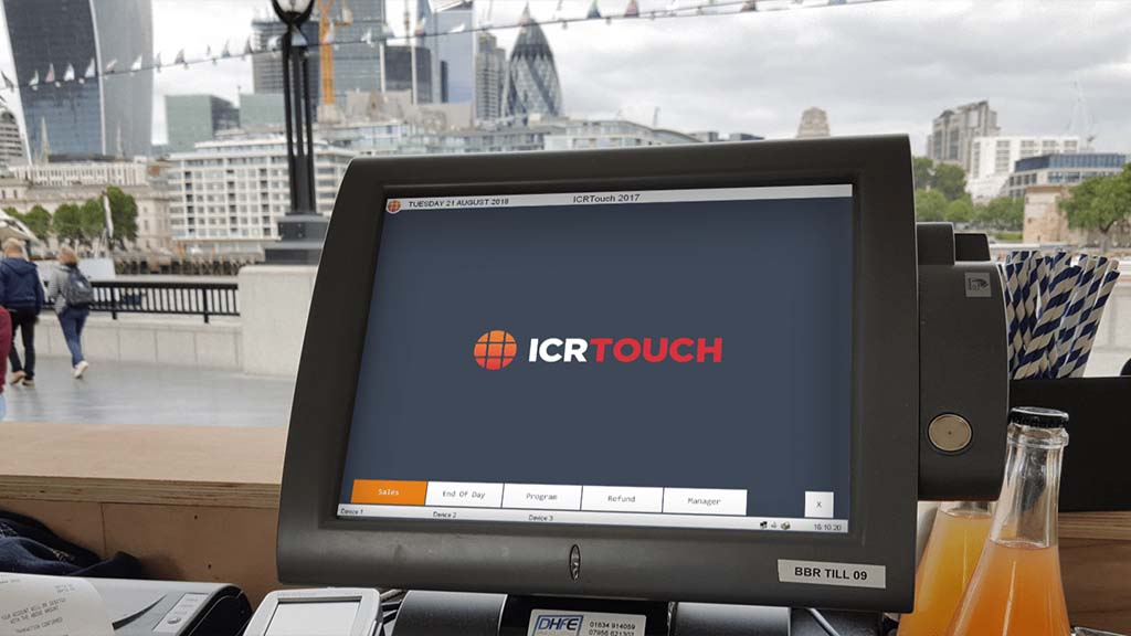 An ICRTouch TouchPoint till on the counter of a cafe
