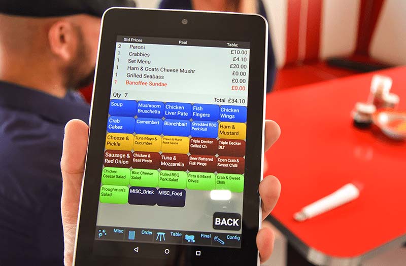 ICRTouch PocketTouch digital order tablet being used in a diner